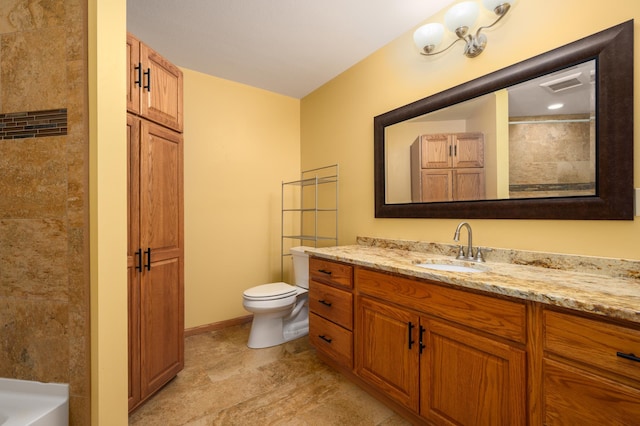 bathroom featuring walk in shower, vanity, and toilet