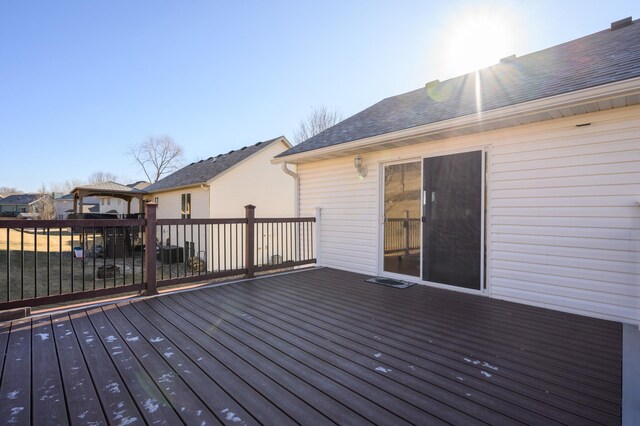 wooden deck featuring a gazebo