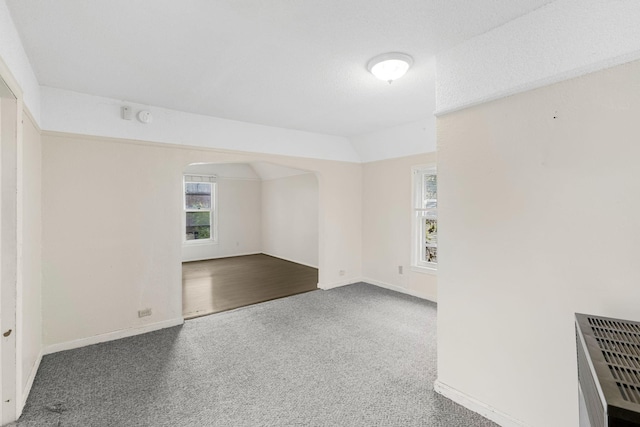 unfurnished room featuring carpet flooring