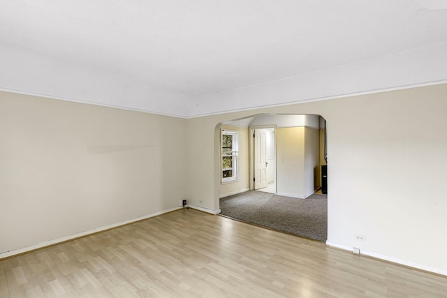 empty room with light hardwood / wood-style floors