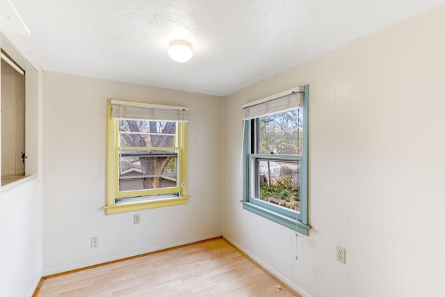 empty room with light wood-type flooring