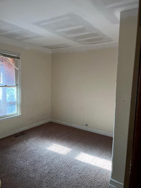 empty room with carpet floors