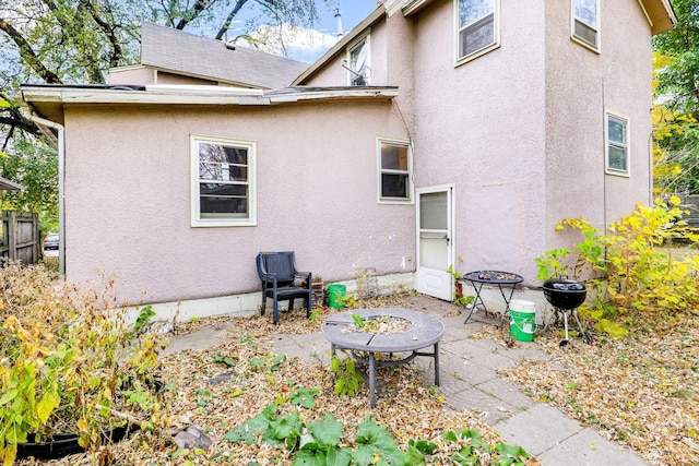 rear view of property with a patio