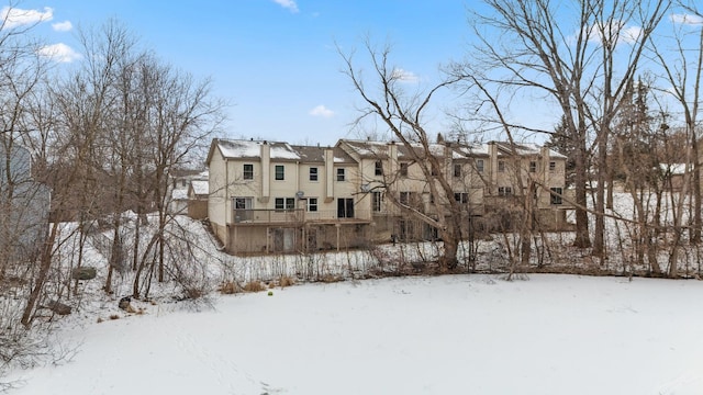 view of snow covered property