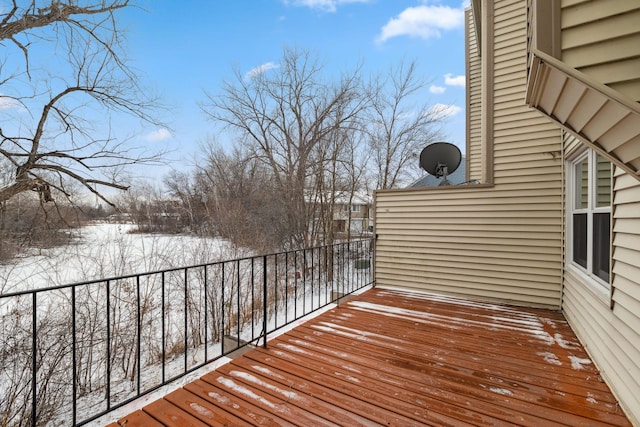 view of snow covered deck