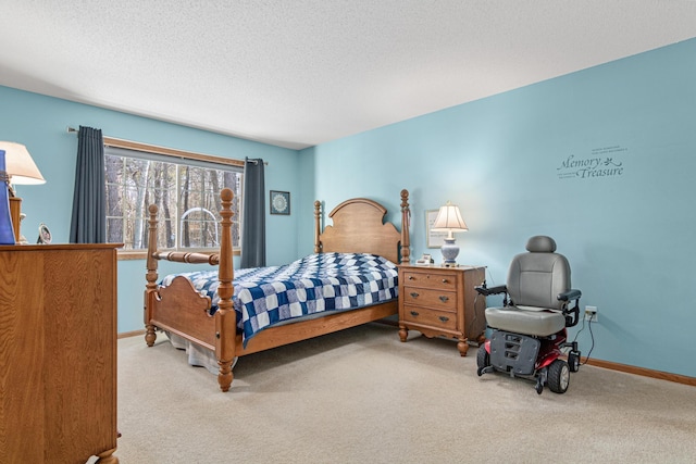 carpeted bedroom featuring a textured ceiling