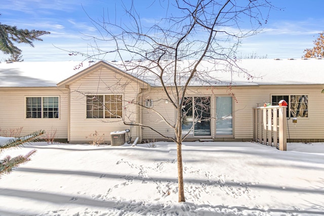 view of snow covered house