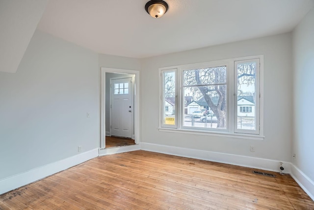 foyer with light hardwood / wood-style flooring