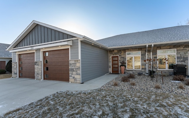 ranch-style home featuring a garage