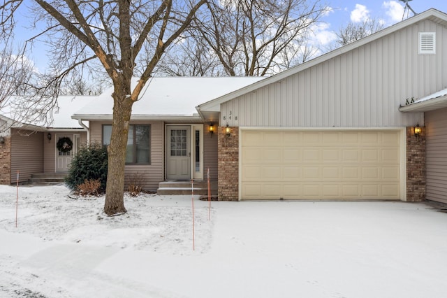 single story home with a garage