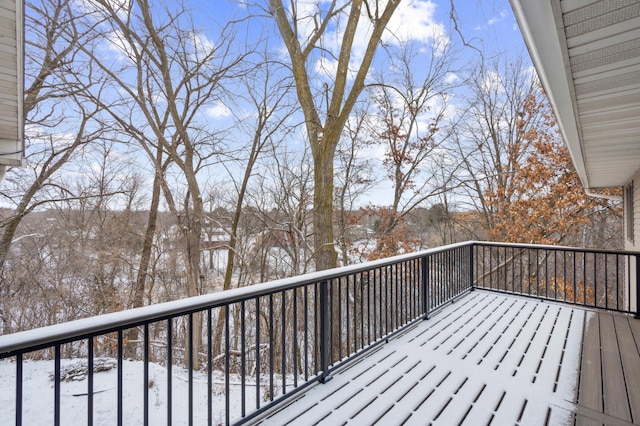 view of snow covered deck