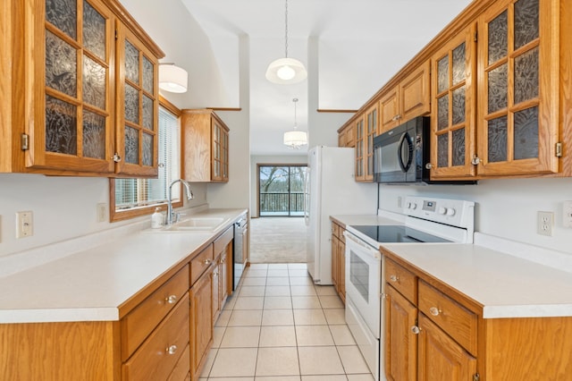 kitchen with stainless steel dishwasher, sink, light tile patterned floors, pendant lighting, and white electric range