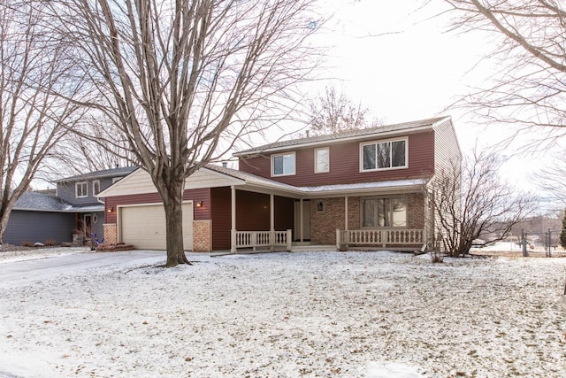 view of property featuring a garage and a porch