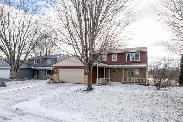 front of property featuring a porch and a garage