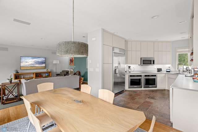 dining room featuring sink