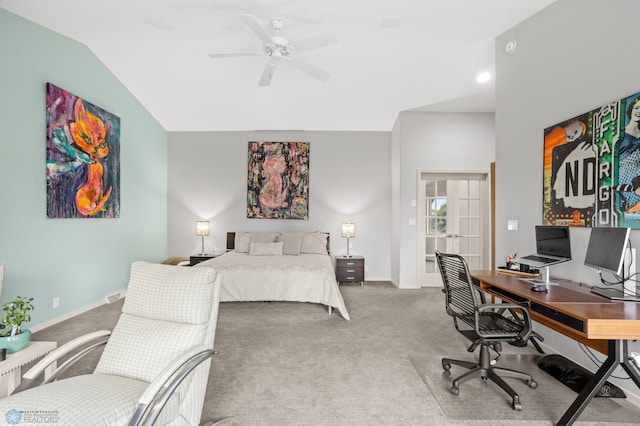 carpeted bedroom with vaulted ceiling and ceiling fan