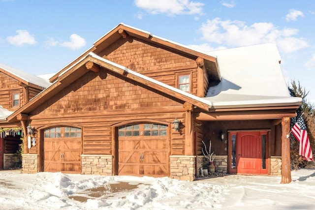 log home with a garage