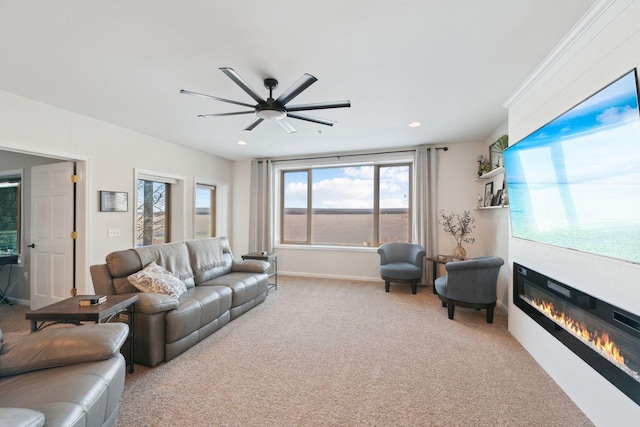 carpeted living room featuring ceiling fan