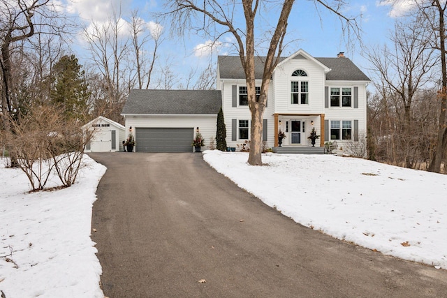 view of front of house featuring an outdoor structure