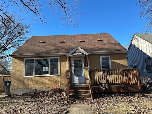 view of front facade with a deck