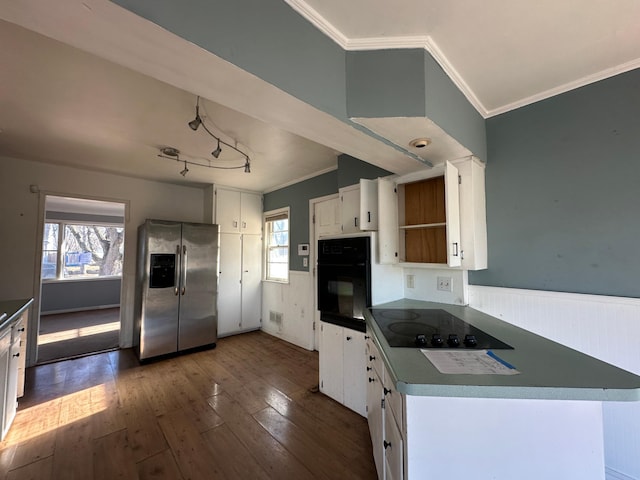 kitchen with crown molding, dark wood-type flooring, white cabinets, and black appliances