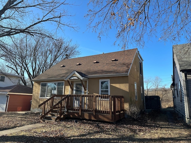 view of front of property with a deck