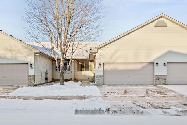 single story home with a garage