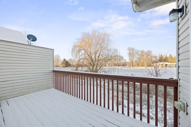 view of snow covered deck