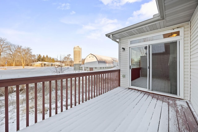 view of snow covered deck