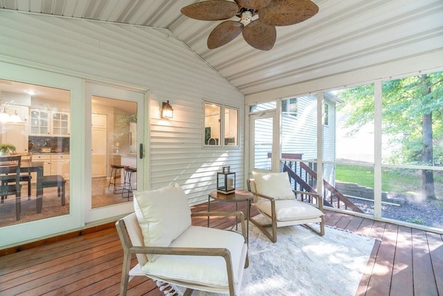 sunroom / solarium with vaulted ceiling and ceiling fan