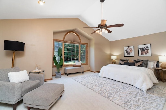 bedroom with carpet flooring, ceiling fan, and lofted ceiling