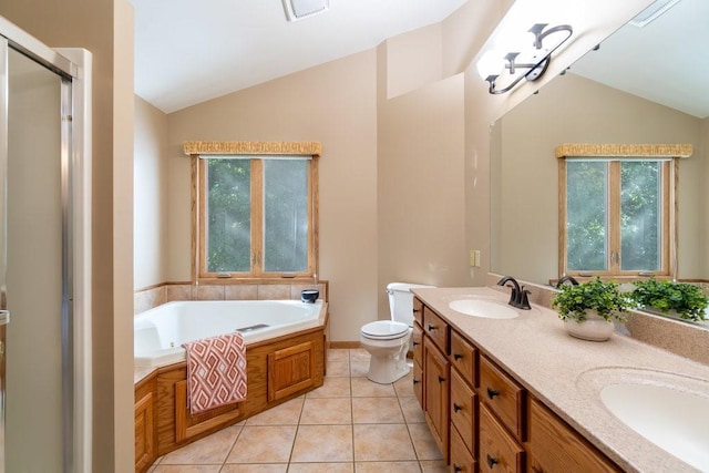 full bathroom with tile patterned flooring, vanity, toilet, and lofted ceiling