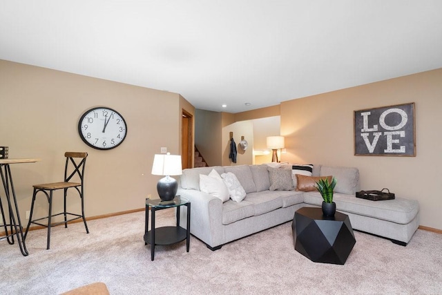 living room featuring light colored carpet