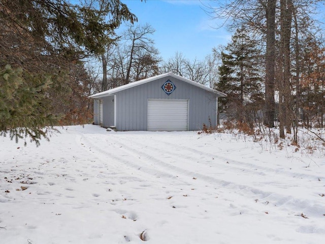 view of snow covered garage