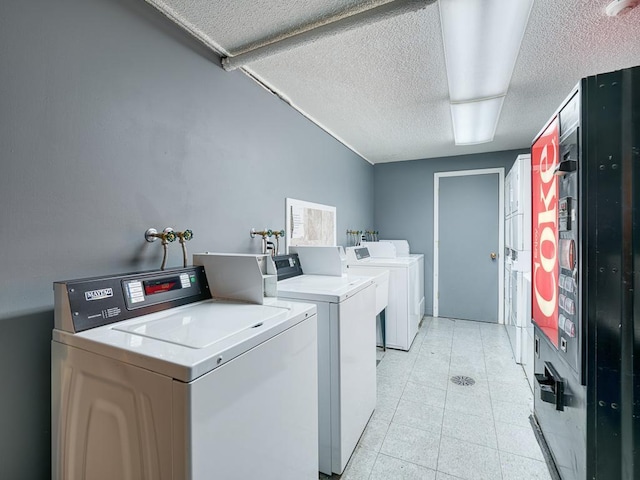 laundry room with washer and dryer