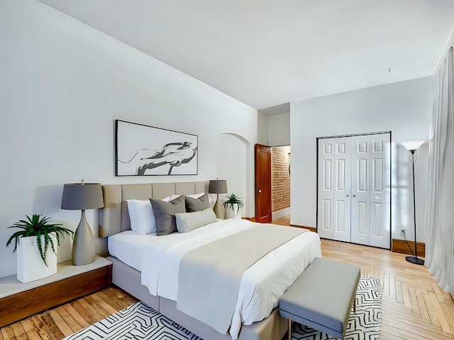 bedroom with a closet and light wood-style floors