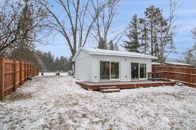 view of snow covered property