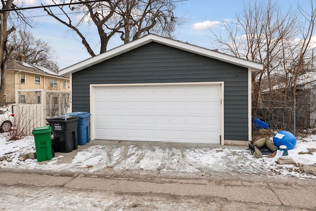 view of snow covered garage