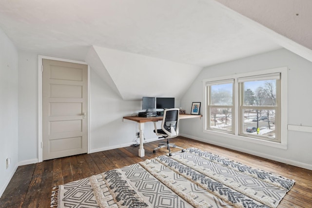 home office featuring lofted ceiling and dark hardwood / wood-style flooring