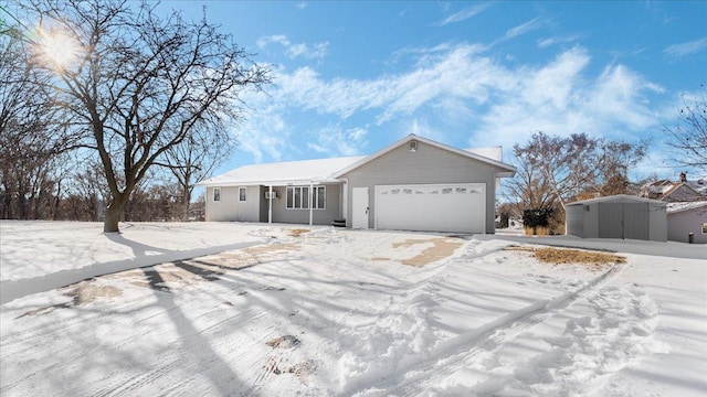 ranch-style house featuring a garage