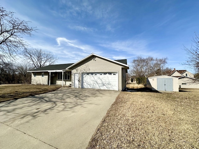 ranch-style house featuring an outbuilding, a front lawn, driveway, a shed, and a garage