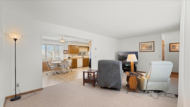 205 Ash St N, Sauk Centre, MN 56378 - living area featuring light colored carpet and an office area