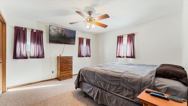 205 Ash St N, Sauk Centre, MN 56378 - carpeted bedroom featuring baseboards and a ceiling fan