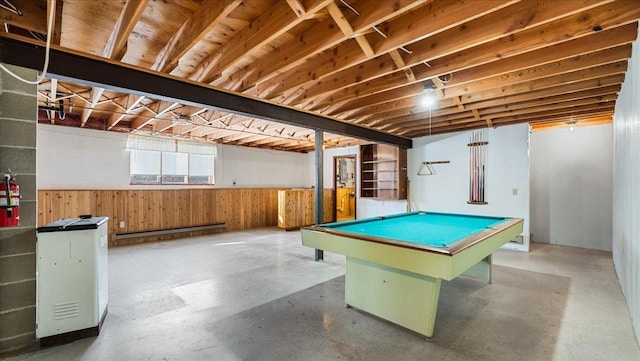 205 Ash St N, Sauk Centre, MN 56378 - rec room featuring baseboard heating, a wainscoted wall, concrete flooring, billiards table, and wood walls