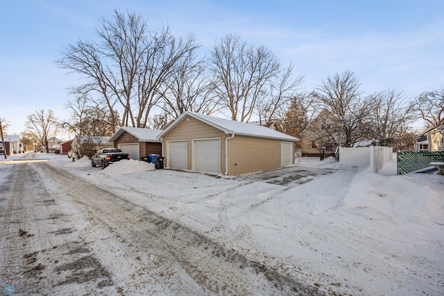 view of snow covered garage