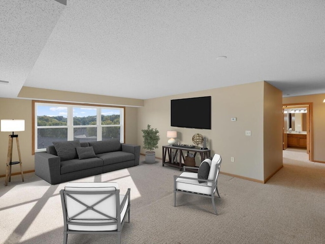 living room with light carpet and a textured ceiling