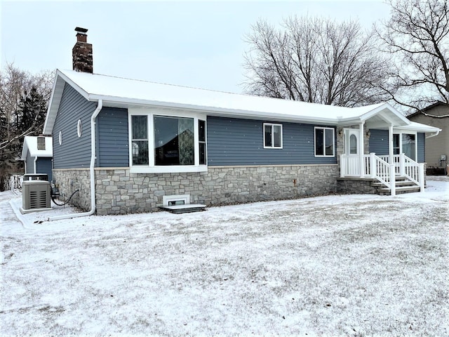 view of front of home with central air condition unit