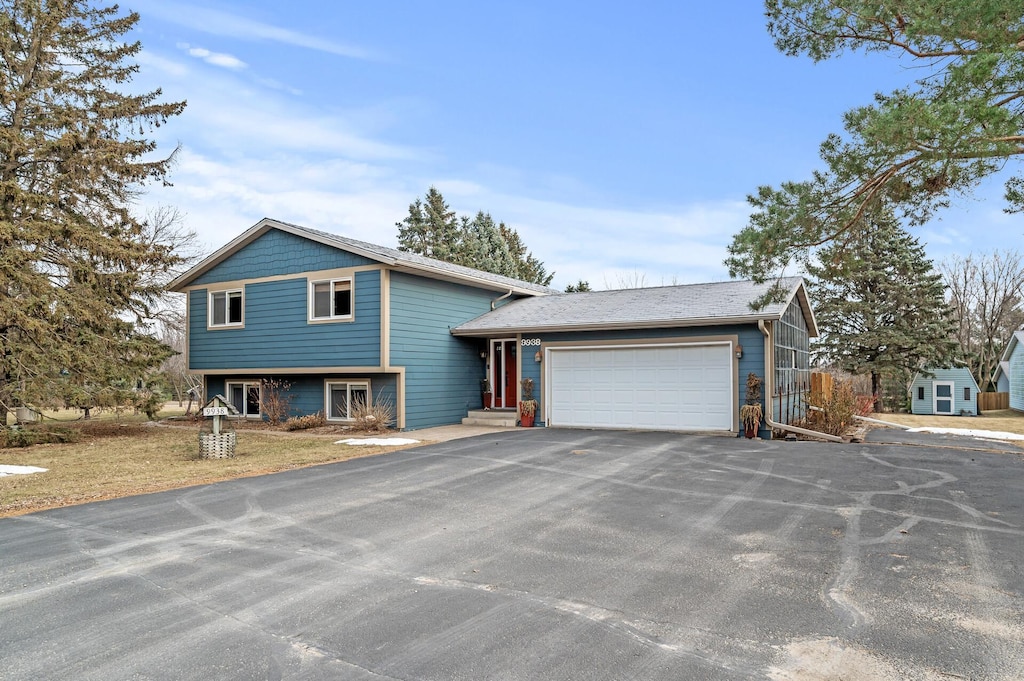 tri-level home featuring a garage