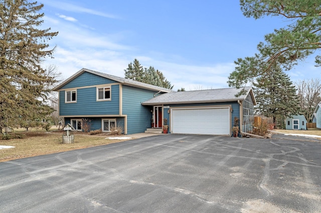 tri-level home featuring a garage