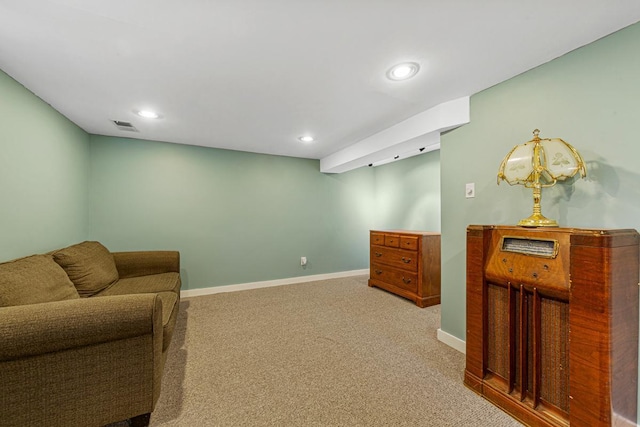 sitting room featuring carpet, visible vents, baseboards, and recessed lighting